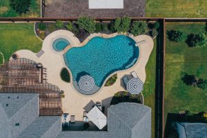 Light and Bright Freeform Oasis Swimming Pool Project - Claffey Pools