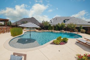 Light and Bright Freeform Oasis Swimming Pool Project - Claffey Pools