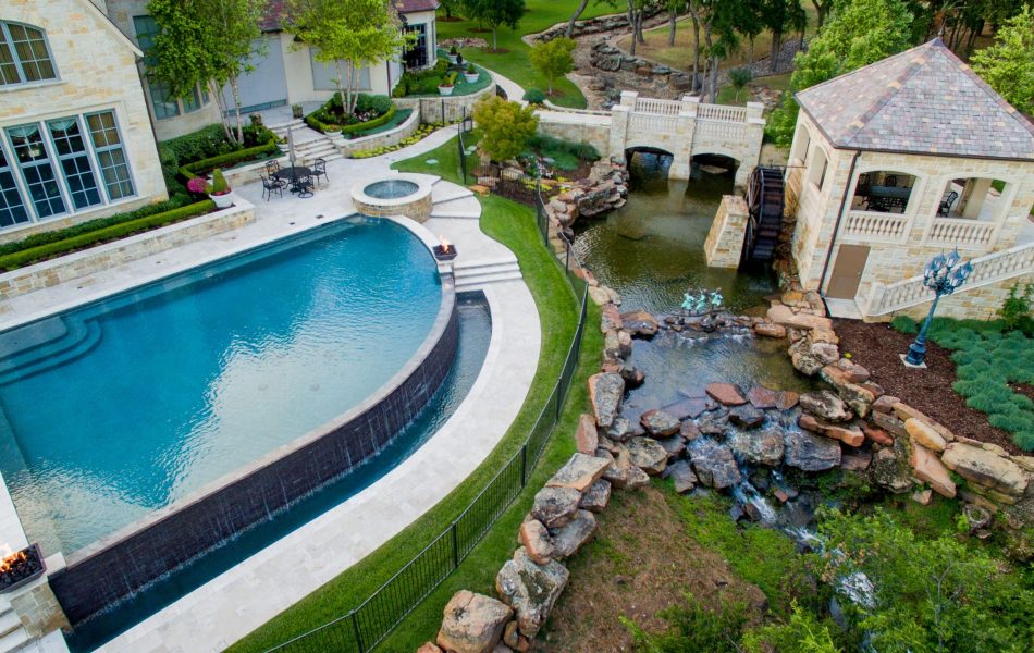 Flower Mound Infinity Pool with Water Wheel Claffey Pools