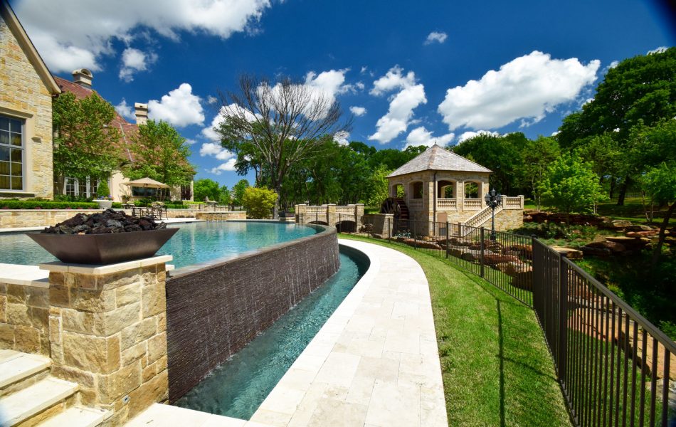 Flower Mound Infinity Pool with Water Wheel Claffey Pools