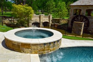 Flower Mound Infinity Pool with Water Wheel Claffey Pools