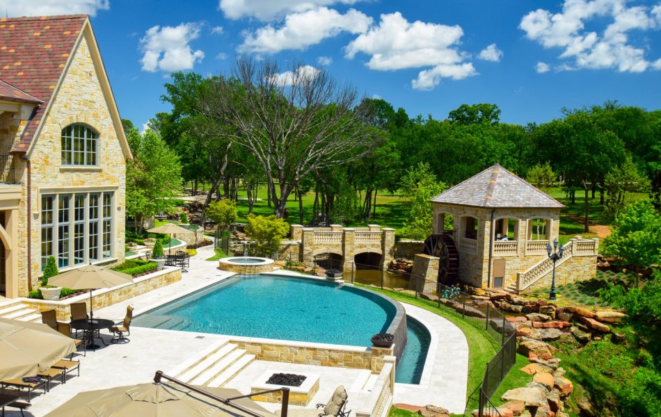 Flower Mound Infinity Pool with Water Wheel Claffey Pools