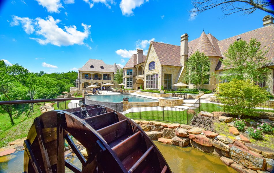 Flower Mound Infinity Pool with Water Wheel Claffey Pools