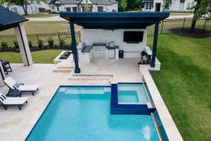 swimming pool with outdoor kitchen