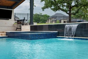 swimming pool with waterfall