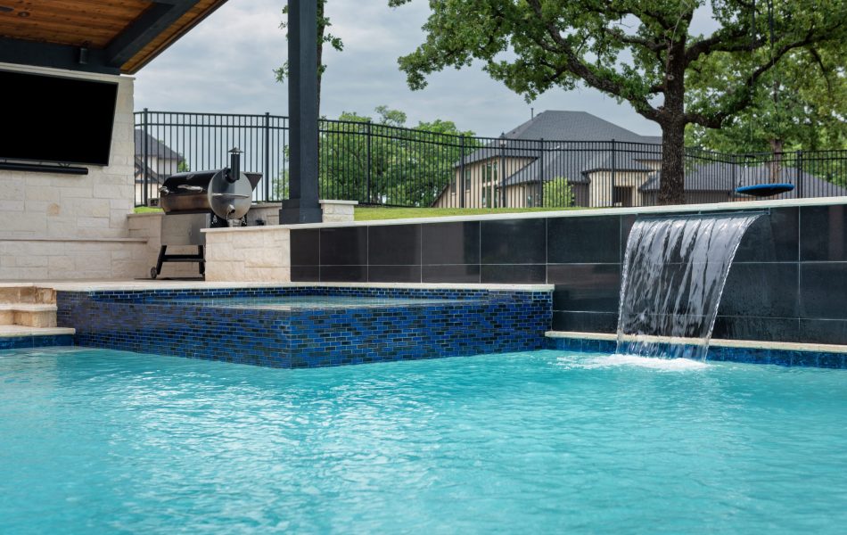 swimming pool with waterfall