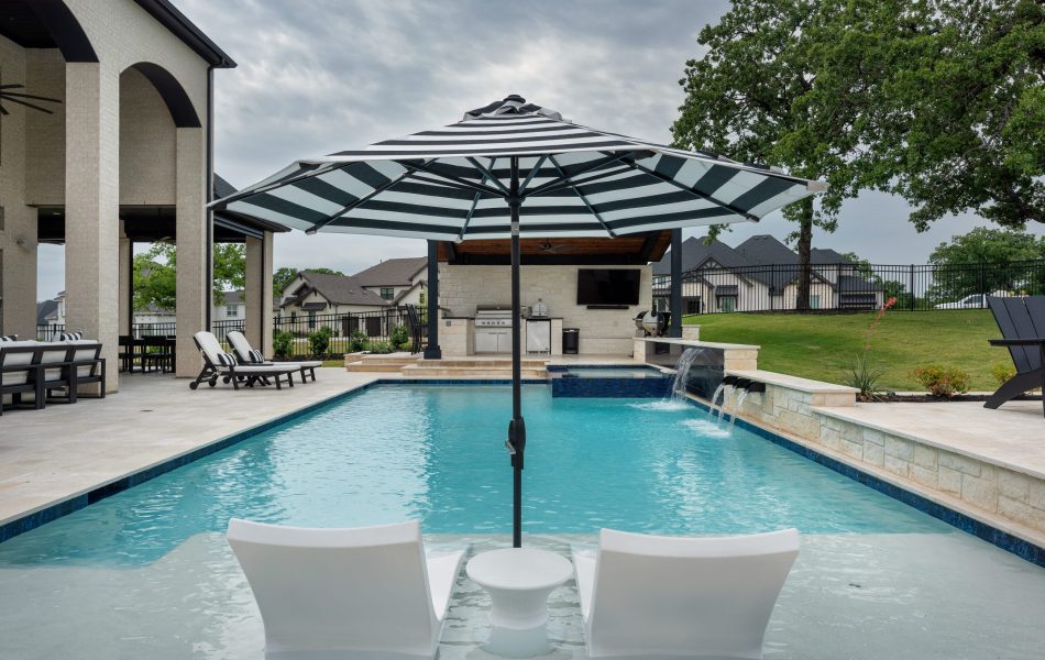 swimming pool with tanning ledges